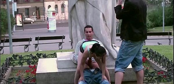  Cute teen girl fucked by 2 guys in PUBLIC in center of the city by famous statue
